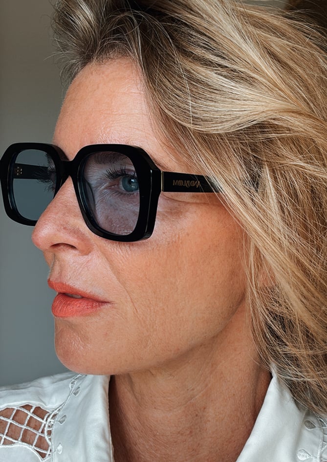 Side view of Lilium sunglasses – AndBloom, close-up portrait outdoors