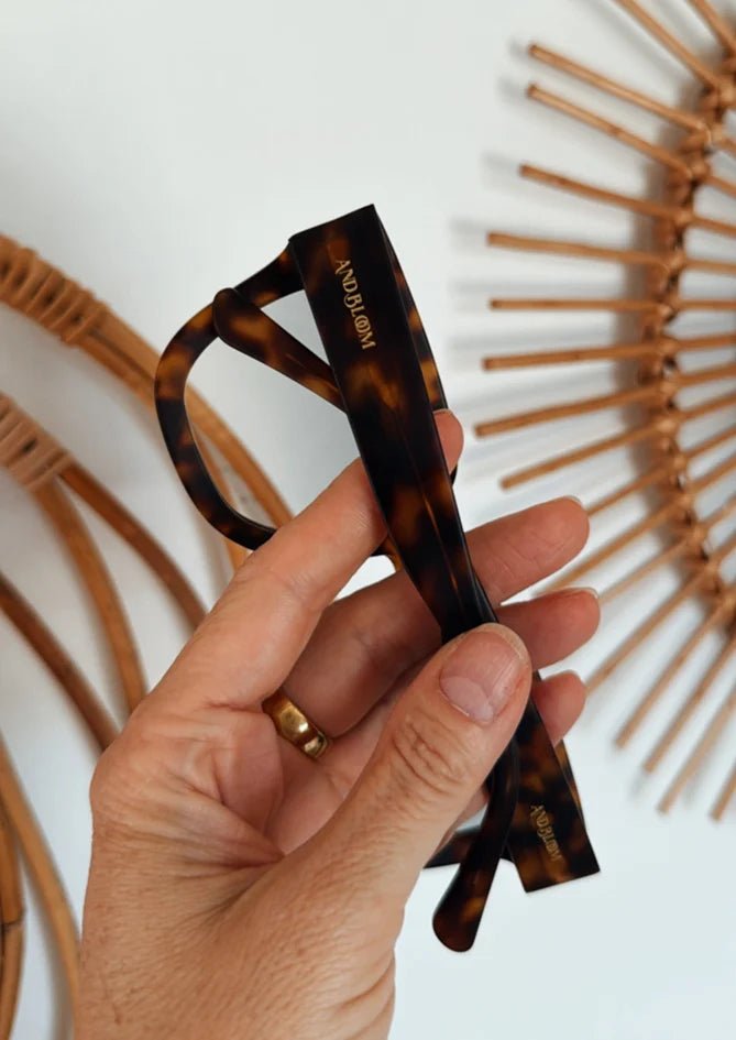 Myrto – AndBloom eyewear showcased with chic minimalist outfit