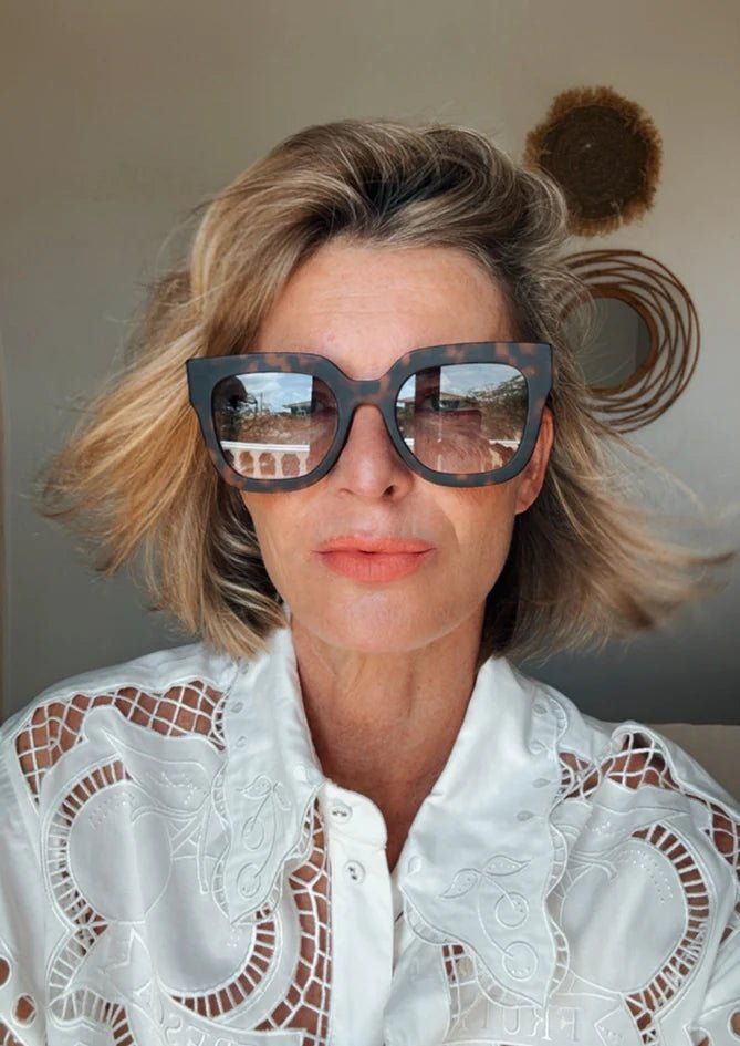 AndBloom Myrto sunglasses – detail of frame worn outdoors