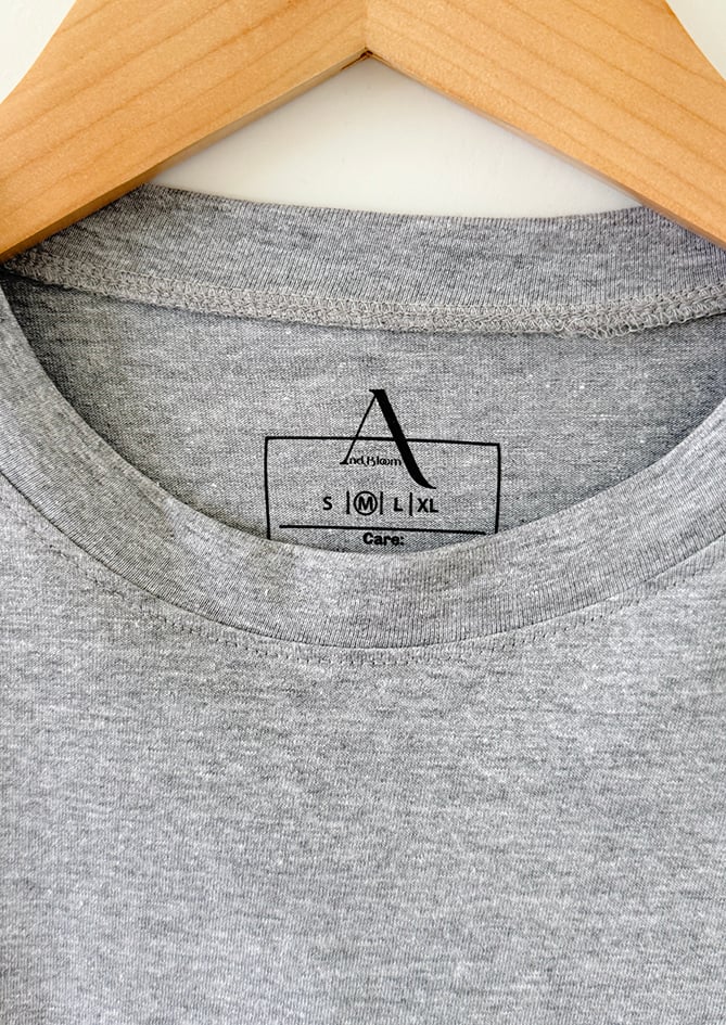 Minimalist folded view of The Classic Grey – AndBloom T-shirt