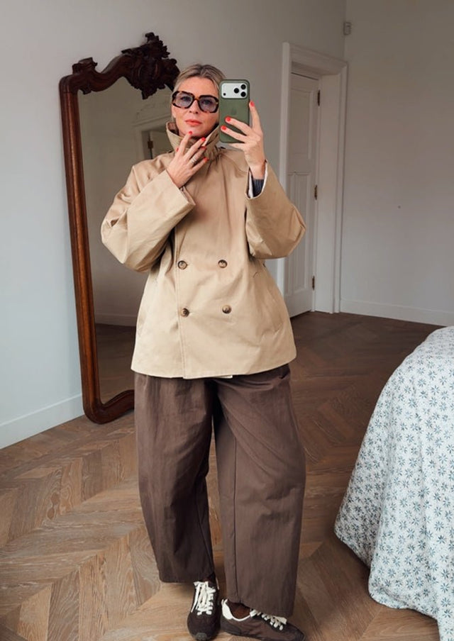AndBloom - The Path - Beige Trench Coat for women - Dee wearing the coat